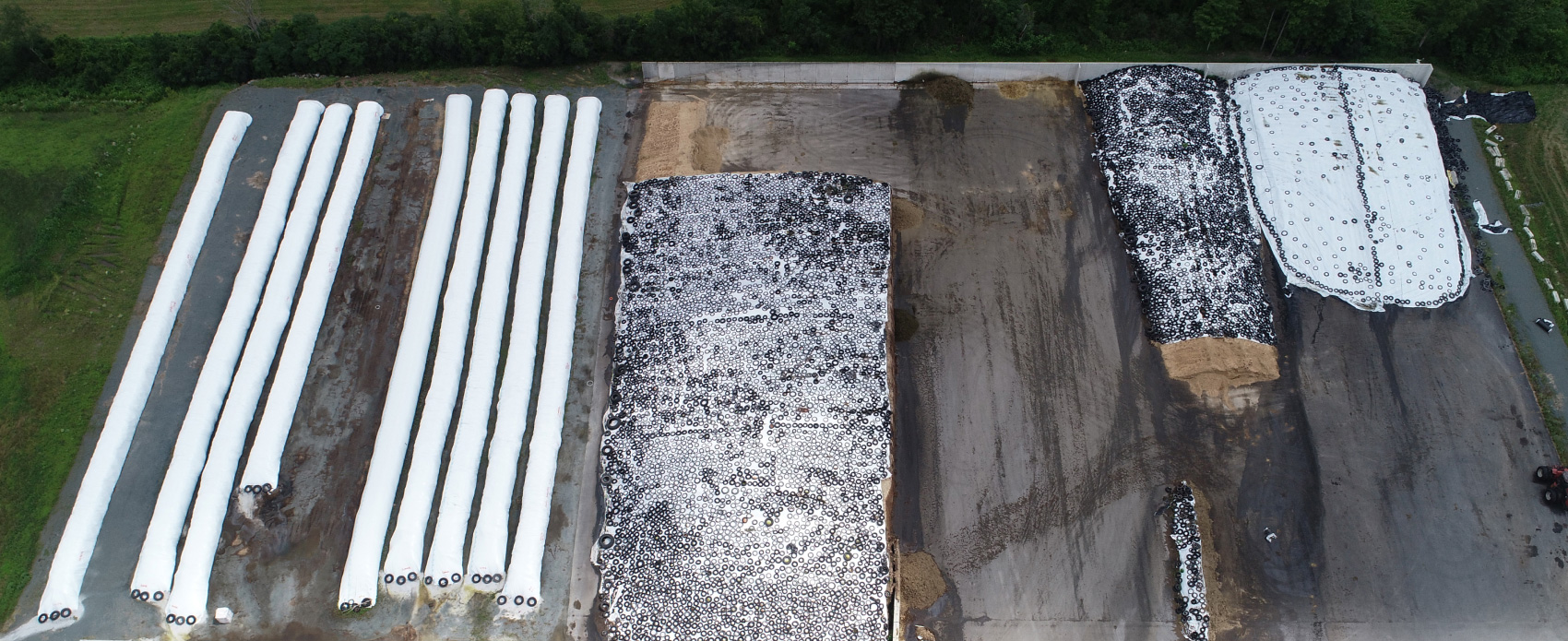 Aerial view of dairy farm with silage piles